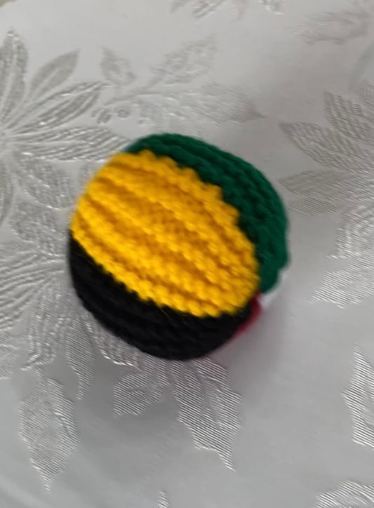 Pattern for crocheted five color ball.